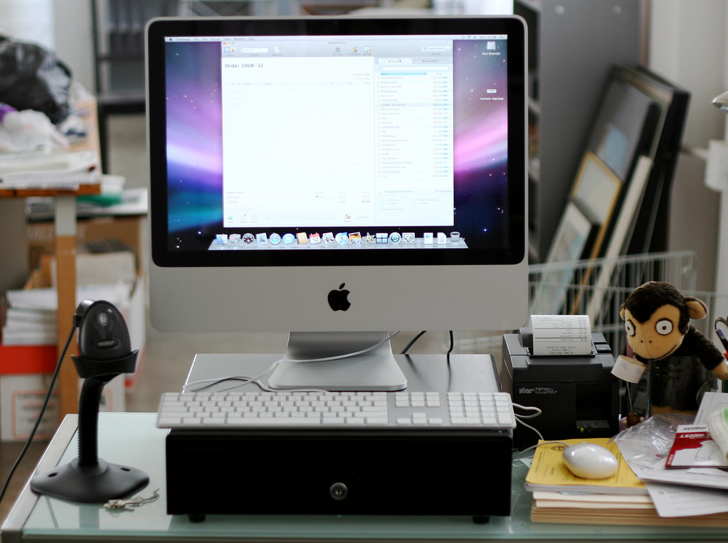 POS terminal setup with a barcode scanner and receipt printer used for retail checkout